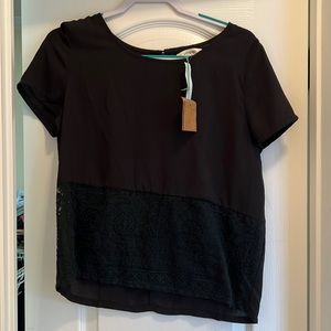 Black top with beautiful lace detailing shown above